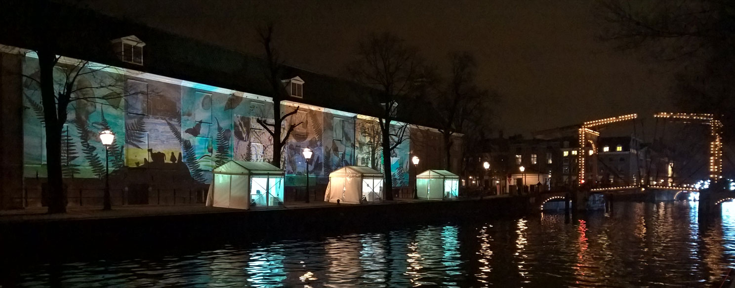 Coloured projections at  Amsterdam Light Festival 2017-2018 near Amsterdam Hermitage Museum